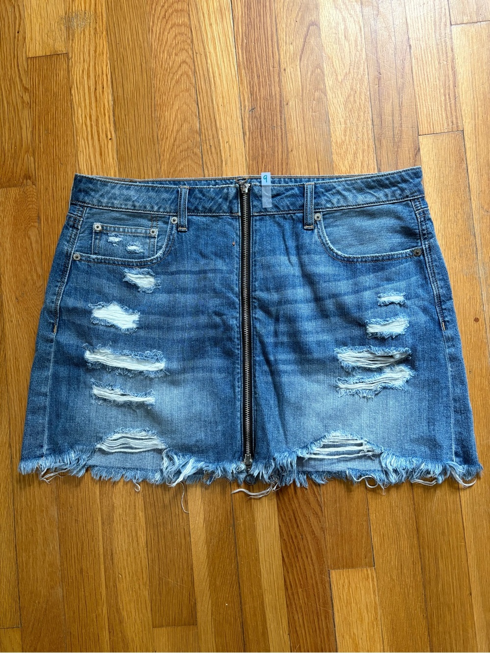 American Eagle Outfitters Distressed Blue Denim Mini Skirt with Center Zip